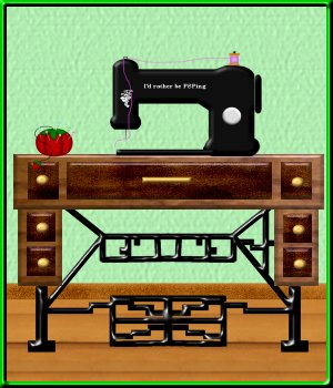 Sewing Machine, cabinet, and pincushion